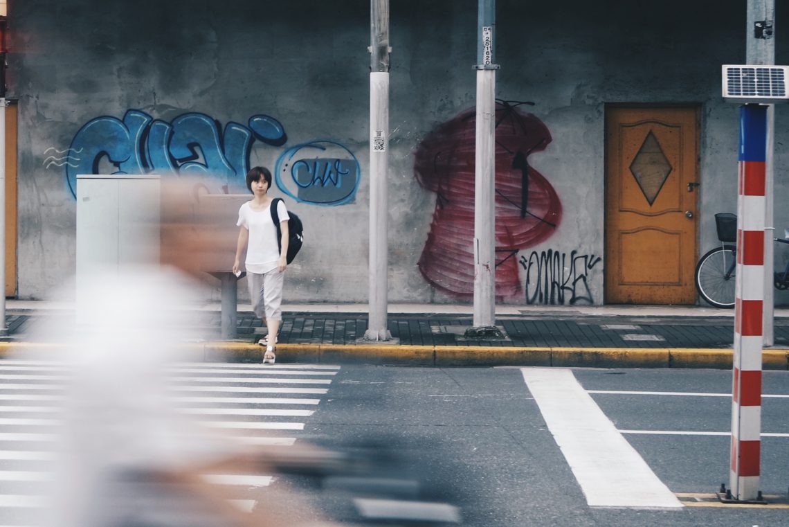 Woman crossing street